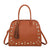 Borsa bauletto in ecopelle con borchie e occhielli e charm frangia 2279