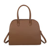 Borsa bauletto in ecopelle con borchie e occhielli e charm frangia 2279