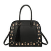 Borsa bauletto in ecopelle con borchie e occhielli e charm frangia 2279