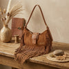 Borsa hobo a tracolla in ecopelle scamosciata con frange VC7093